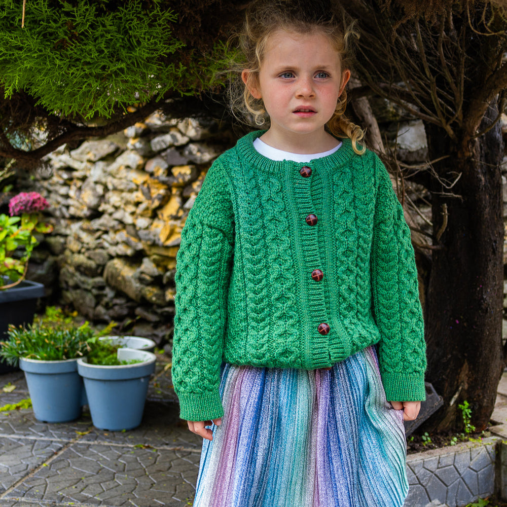Children's Authentic Aran Knitwear – Irish Craftsmanship &amp; Timeless Style

Wrap your little ones in the enchanting warmth of authentic Aran knit cardigans and sweaters, crafted in Ireland with 100% soft merino wool for unbeatable comfort and durability.