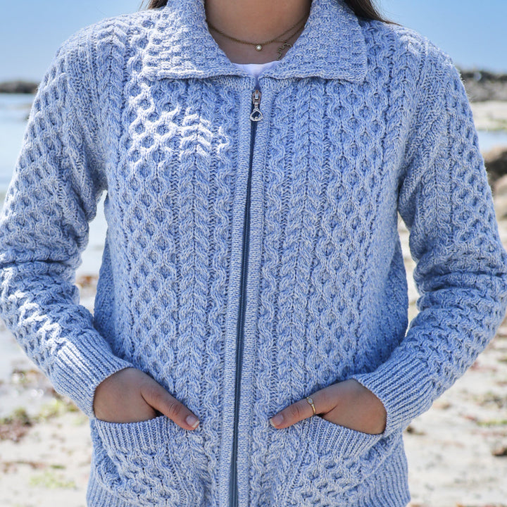 Our Traditional Ladies Aran Full-Zip Cardigan combines timeless Irish heritage with everyday comfort and style ☘️🧶 Crafted from luxuriously soft 100% Merino wool, this beautifully designed cardigan offers warmth, breathability, and effortless elegance for every season.