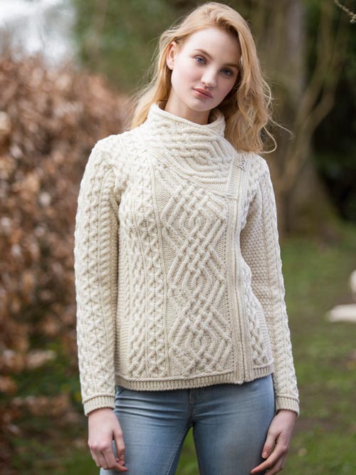 ☘️ Ladies Irish-Made Side-Zip Cable Knit Aran Cardigan 🧶
Biker Style Meets Timeless Irish Craftsmanship

Elevate your wardrobe with the Ladies Irish-Made Side-Zip Cable Knit Aran Cardigan, a bold take on traditional Aran knitwear with a modern, biker-inspired twist.

🌟 Key Features You’ll Love:
🧵 Premium Material: Made from 100% Supersoft Merino Wool for unmatched warmth, softness, and comfort.
🪡 Stylish Design: Features a unique side-zip closure, adding a modern biker edge to the classic Aran car