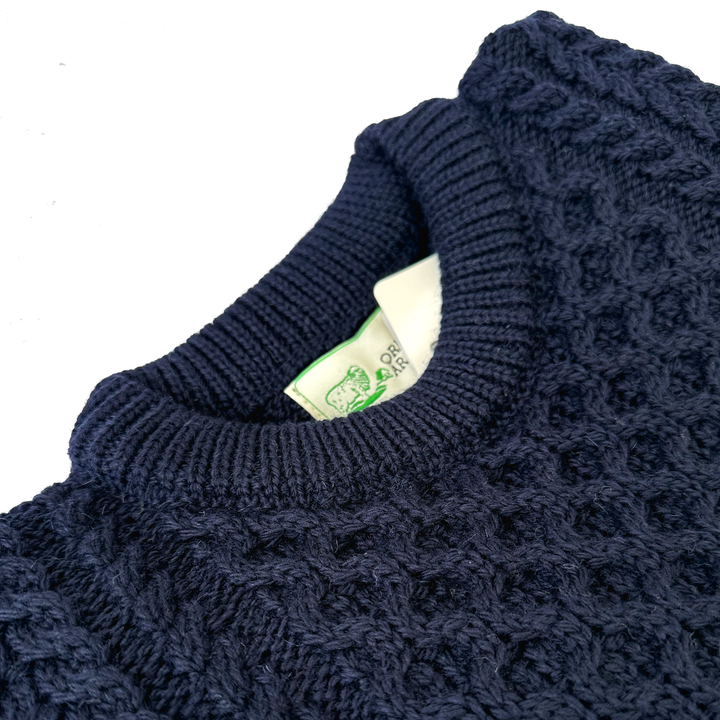 Irish Aran Knit Sweater – Timeless Craftsmanship and Comfort

Discover the perfect blend of tradition and style with our unisex Irish Aran Knit Sweater, crafted in Ireland using 100% super-soft Merino wool. 🌿

Luxurious Comfort: Soft, durable, and naturally breathable for year-round wear.
Rich Heritage: Features iconic Aran stitches like cable, honeycomb, and diamond, symbolizing strength, luck, and connection.
Crafted in Ireland: Made with care by skilled artisans, celebrating Irish knitting traditions.
V