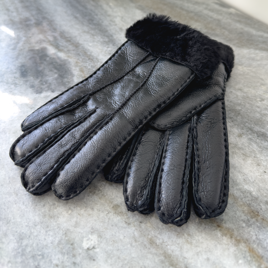 Indulge in unmatched comfort and sophistication with our exquisite sheepskin gloves, meticulously crafted to elevate your winter wardrobe. Made from premium sheepskin leather, these gloves offer unparalleled softness and warmth, ensuring your hands stay cozy even in the coldest of temperatures.