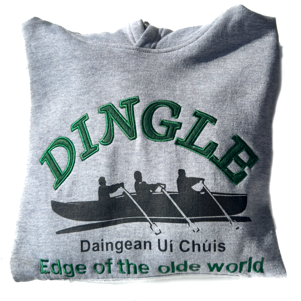 McKenna's of Dingle proudly presents the Namhóg sweatshirt, inspired by the traditional Irish boat, the Namhóg. This unique vessel, with a wooden frame and historically covered in animal skins or hides (now commonly adorned with canvas), carries a rich heritage deeply rooted in Ireland’s maritime history. The name "Namhóg" is sometimes anglicized as "curragh," and it plays a crucial role in Ireland's seafaring legacy. 🌍